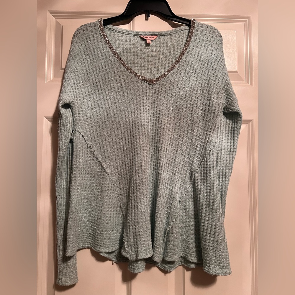 Juicy Couture woven turquoise dressy top edged in sparkles at the neckline.
